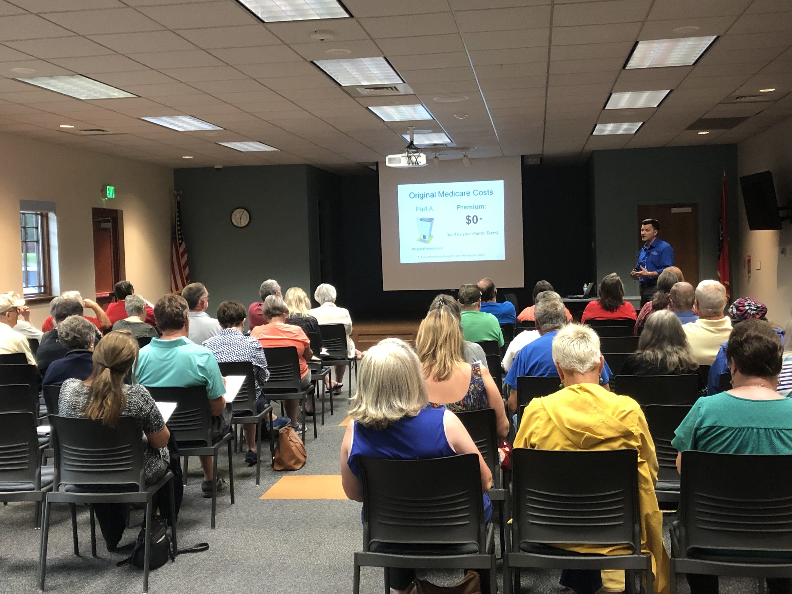 Attendees learning about Medicare at a Seniors Benefit seminar
